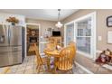 Kitchen features a breakfast nook and view into Gathering room at 1318 Gum Branch Rd, Charlotte, NC 28214