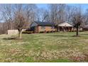 Charming brick home with a well-manicured lawn and solar panels on the roof at 503 Brookfield Cir # 1, Salisbury, NC 28146