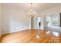 Formal dining room with hardwood floors and chandelier at 606 Elmhurst Dr, Fort Mill, SC 29715