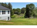Expansive backyard offering serene views and ample space for outdoor activities at 106 Gilliatt St, Shelby, NC 28150