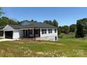 Attractive single-story home with a welcoming porch and well-maintained lawn at 106 Gilliatt St, Shelby, NC 28150