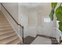 Bright and airy entryway with staircase and wood flooring at 1206 Croft Dr # 98, Fort Mill, SC 29708