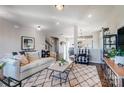 Bright and inviting living room featuring neutral decor, stylish furnishings, and dark wood flooring at 128 Shay Crossing Rd, Salisbury, NC 28146