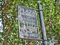 Decorative street sign showing that this property is in the Plaza Midwood historic district circa 1903 at 2116 Mcclintock Rd, Charlotte, NC 28205