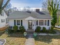 Charming white house with a classic design, landscaped yard, and walkway at 531 Elm St, Salisbury, NC 28144