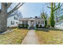 White house with classic design, landscaped yard, and walkway at 531 Elm St, Salisbury, NC 28144