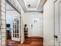 Inviting foyer with hardwood floors, leading to a sunlit office space at 1108 Township Pkwy, Belmont, NC 28012