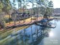 Lakefront property with a private dock and gazebo at 168 Tanglewood Cv, Belmont, NC 28012