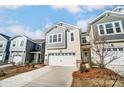 Inviting exterior with a white garage, neutral siding, and attractive landscaping at 260 Laura Elizabeth Ln, Clover, SC 29710