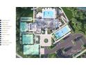 Overhead view of community amenities including pool, tennis courts, clubhouse, and parking at 3038 Finchborough Ct # 234, Charlotte, NC 28269