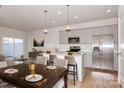 Modern kitchen with stainless steel appliances and an island at 33 Woodsdale Se Pl, Concord, NC 28025