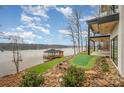 Lakefront property with private dock and putting green at 8092 Edgewater Dr, Norwood, NC 28128