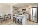 Modern kitchen with stainless steel appliances and granite countertops at 1300 Reece Rd # G-18, Charlotte, NC 28209