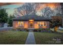 Charming brick house with walkway and stone accents at 1334 7Th Nw St, Hickory, NC 28601