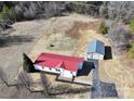 Aerial view showing a house with a red metal roof and a separate garage at 291 Patterson Farm Rd, Mooresville, NC 28115