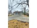 Newly renovated craftsman home with gray siding, front porch, and landscaping at 301 W Hartford Ave, Bessemer City, NC 28016