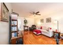 Bright living room with hardwood floors, comfortable seating, and built-in shelving at 1335 12Th Street Nw Dr # 15, Hickory, NC 28601