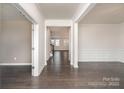 Bright and spacious entryway with hardwood floors, leading to the living areas at 17613 Shasta Daisy Cir, Davidson, NC 28036