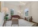 Bright living room featuring stylish furnishings, neutral color palette, and lots of natural light at 211 Brooklyn Ave, Lancaster, SC 29720