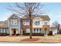 Attractive townhomes with brick facades and neat landscaping offering curb appeal at 3273 Bending Birch Pl, Charlotte, NC 28206