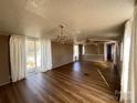 Spacious living room with hardwood floors and sliding glass doors at 3610 Becky Ln, Monroe, NC 28112