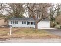 Updated ranch home featuring a new paint job and driveway at 809 Miller St, Gastonia, NC 28052