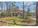 View of the front yard and exterior of the home from the street at 1077 Gauguin Ln, Tega Cay, SC 29708