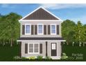 Rendering of a charming two-story home with dark brown siding, a covered porch, and lush landscaping at 204 N Yadkin Ave, Spencer, NC 28150