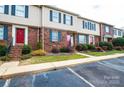 Row of townhouses with brick and siding exteriors at 2705 N Center St # 65, Hickory, NC 28601