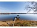 Serene lakefront view with private dock and gazebo at 3474 Lake Wylie Dr, Rock Hill, SC 29732