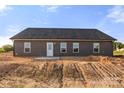 Exterior rear view of a single-Gathering home showing the back door at 5177 Flay Rd, Lincolnton, NC 28021