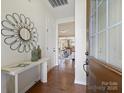 Hardwood floor entryway with view into living room at 1018 Archibald Ave, Fort Mill, SC 29708