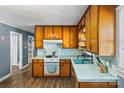 Charming kitchen with classic wood cabinets, laminate counter tops, and modern appliances at 226 Bradley Farm Rd, Statesville, NC 28625