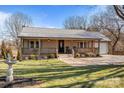 Charming single-story home with inviting front porch and manicured lawn at 236 Ervin Rd, Mooresville, NC 28117