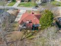 Aerial view of the home showcasing the backyard, deck, and surrounding mature trees at 3447 Nesting Ln, Fort Mill, SC 29708