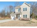 Two-story house with brick accents and a white door at 3714 Small Ave, Charlotte, NC 28269