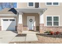 Attractive front entrance with brick columns and a wreath at 3714 Small Ave, Charlotte, NC 28269