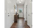 Bright and spacious foyer with hardwood floors and white doors at 8348 Acadia Pkwy, Sherrills Ford, NC 28673