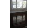 Bedroom featuring hardwood floors and natural light at 105 N Inman Ave, Bessemer City, NC 28016