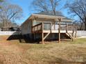 Exterior of the house, displaying the deck with wooden beams at 1120 Cedar St, Mount Holly, NC 28120