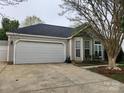 One-story home boasting a spacious two-car garage and manicured landscaping at 3507 Southern Ginger Dr, Indian Trail, NC 28079