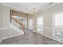 Elegant dining room with hardwood floors and chandelier at 637 Tysons Forest Dr, Rock Hill, SC 29732