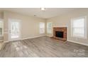 Bright living room with hardwood floors and fireplace at 637 Tysons Forest Dr, Rock Hill, SC 29732