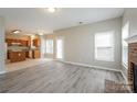 Living room features hardwood floors and a brick fireplace at 637 Tysons Forest Dr, Rock Hill, SC 29732