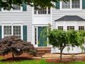 Close-up of the front entrance, highlighting the door and landscaping details at 172 Foxtail Dr, Mooresville, NC 28117