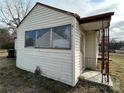 Side view of a light yellow home with a single window at 649 Arch Dr, Rock Hill, SC 29730