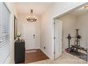 Bright entryway with hardwood floors and access to home gym at 8411 Washoe Pine Ln, Charlotte, NC 28215