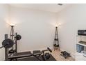 Small home gym with weight bench and other equipment at 8411 Washoe Pine Ln, Charlotte, NC 28215