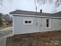 Grey-sided exterior with a single window at 905 Saluda St, Rock Hill, SC 29730