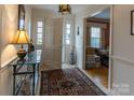 Welcoming entryway featuring a console table and area rug at 2541 Pinewood Rd, Gastonia, NC 28054